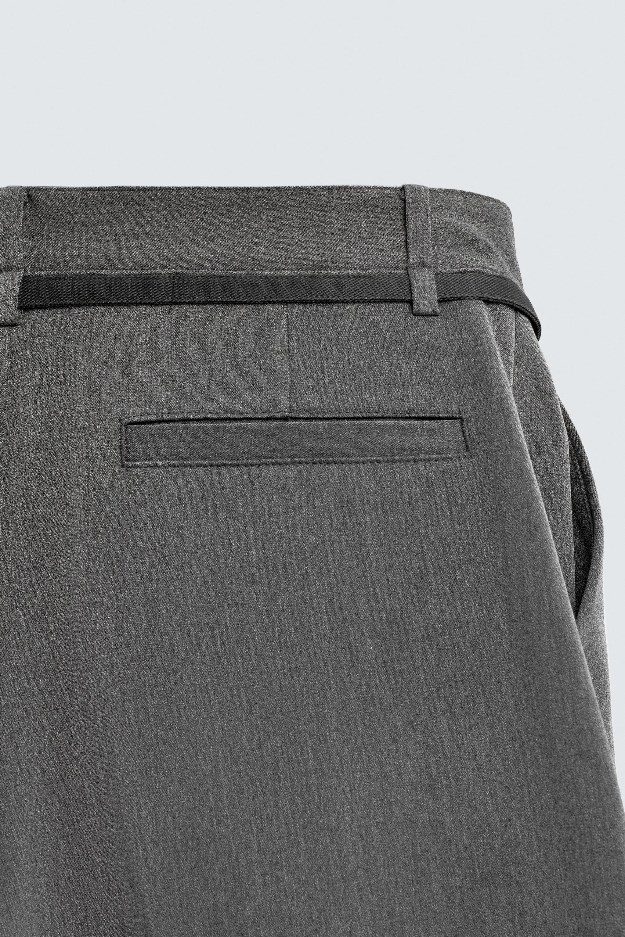 BALLOON PLEATED BELTED PANTS